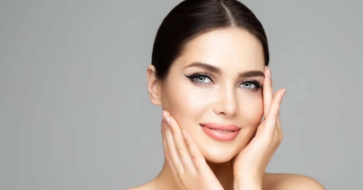 Smiling woman with clear, healthy skin, representing the results of Glo2Facial Treatment in Yukon OK